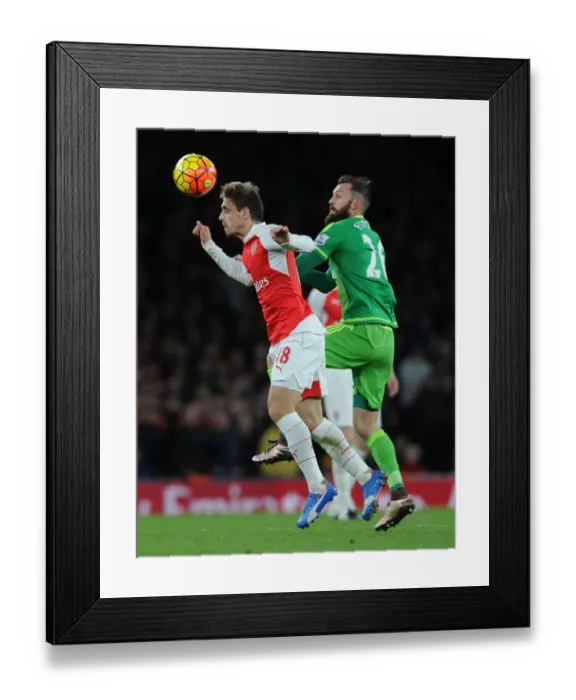 Framed Print : Monreal Soars Over Fletcher: Arsenal's Defender Dominates in the Air against Sunderland Framed Print : Monreal Soars Over Fletcher: Arsenal's Defender Dominates in the Air against Sunderland