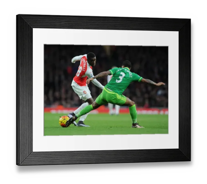 Framed Print : Campbell vs Van Aanholt: A Battle at the Emirates - Arsenal vs Sunderland Premier League Clash Framed Print : Campbell vs Van Aanholt: A Battle at the Emirates - Arsenal vs Sunderland Premier League Clash
