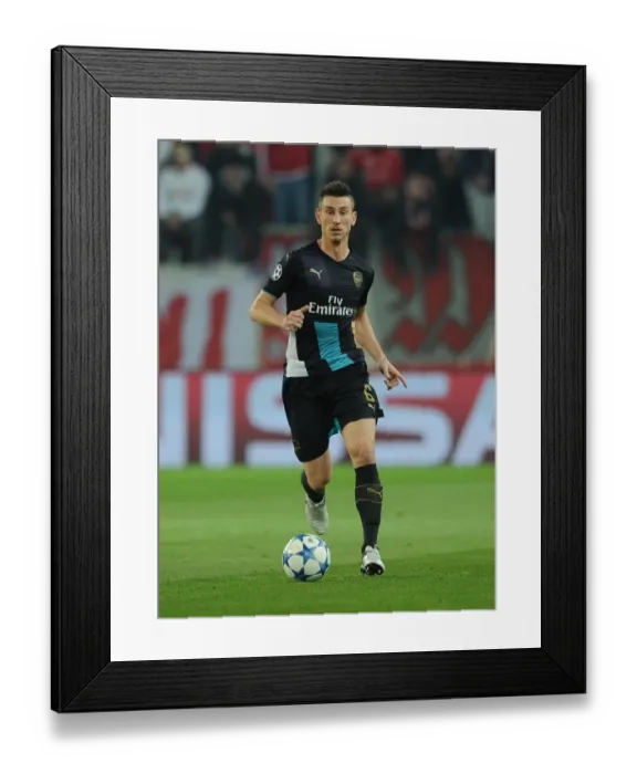 Framed Print : Laurent Koscielny (Arsenal). Olympiacos 0: 3 Arsenal Framed Print : Laurent Koscielny (Arsenal). Olympiacos 0: 3 Arsenal
