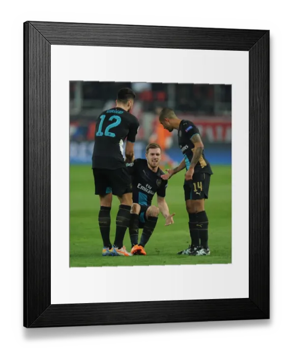 Framed Print : Arsenal's Trio of Ramsey, Giroud, and Walcott Comfort Each Other Amidst Champions League Struggle (Olympiacos v Arsenal 2015-16)