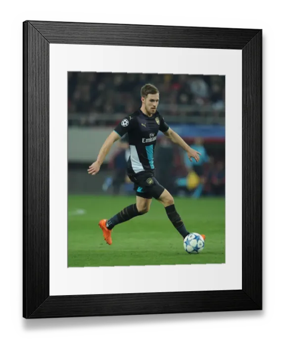 Framed Print : Aaron Ramsey in Action: Arsenal vs. Olympiacos, UEFA Champions League (December 2015)
