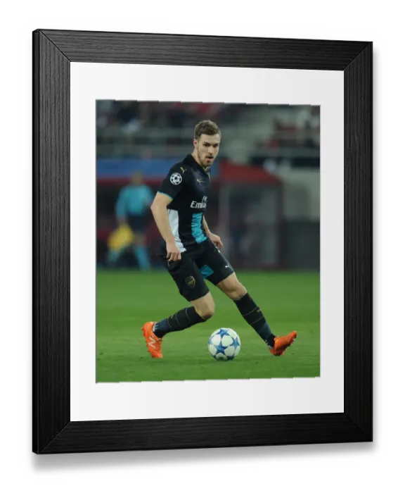 Framed Print : Aaron Ramsey in Action: Arsenal vs. Olympiacos, UEFA Champions League (December 2015)