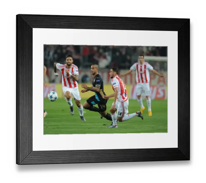 Framed Print : Theo Walcott Outspeeds Omar Elabdellaoui: A Thrilling Moment from Arsenal's UEFA Champions League Clash with Olympiacos (December 2015) Framed Print : Theo Walcott Outspeeds Omar Elabdellaoui: A Thrilling Moment from Arsenal's UEFA Champions League Clash with Olympiacos (December 2015)