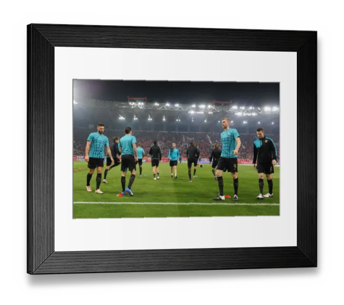 Framed Print : Arsenal's Pre-Match Warm-Up: Olympiacos vs Arsenal, UEFA Champions League 2015-16