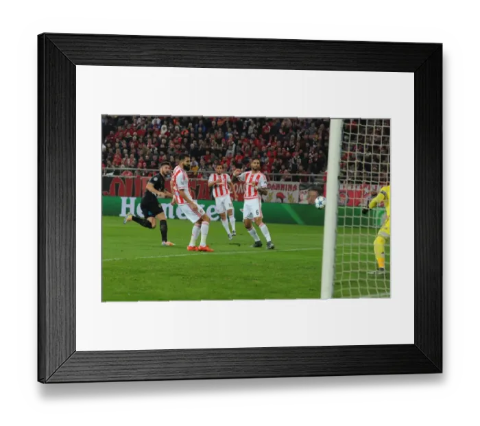 Framed Print : Olivier Giroud's Decisive Goal: Arsenal's UEFA Champions League Victory over Olympiacos (December 2015) Framed Print : Olivier Giroud's Decisive Goal: Arsenal's UEFA Champions League Victory over Olympiacos (December 2015)