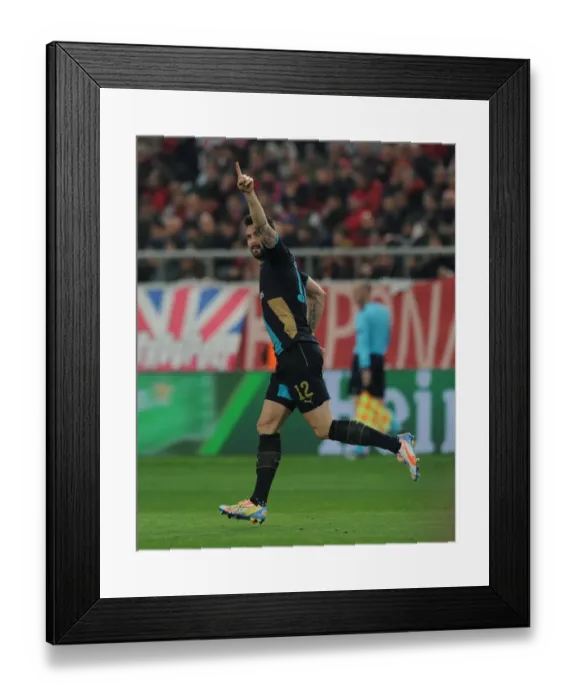 Framed Print : Olivier Giroud's Champion Goal: Arsenal Triumphs Over Olympiacos in UEFA Champions League (December 2015, Athens)
