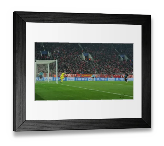 Framed Print : Olivier Giroud Scores the Game-Winning Goal Past Roberto: Arsenal's Victory over Olympiacos in the UEFA Champions League Framed Print : Olivier Giroud Scores the Game-Winning Goal Past Roberto: Arsenal's Victory over Olympiacos in the UEFA Champions League
