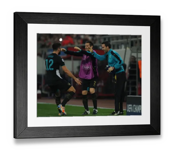 Framed Print : Arsenal Triumph: Olivier Giroud, Mathieu Debuchy, and Shad Forsythe Celebrate Goals Against Olympiacos in the UEFA Champions League Framed Print : Arsenal Triumph: Olivier Giroud, Mathieu Debuchy, and Shad Forsythe Celebrate Goals Against Olympiacos in the UEFA Champions League