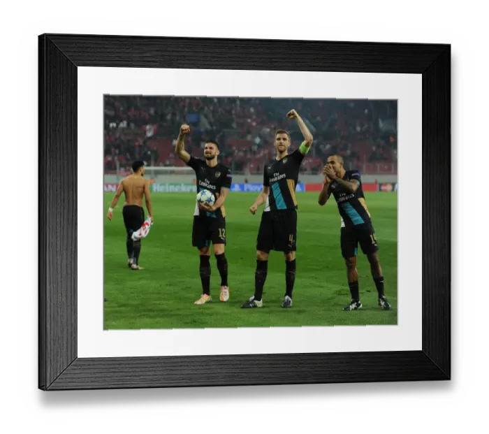 Framed Print : Arsenal's Triumph: Giroud, Mertesacker, and Walcott Celebrate Champions League Victory Framed Print : Arsenal's Triumph: Giroud, Mertesacker, and Walcott Celebrate Champions League Victory