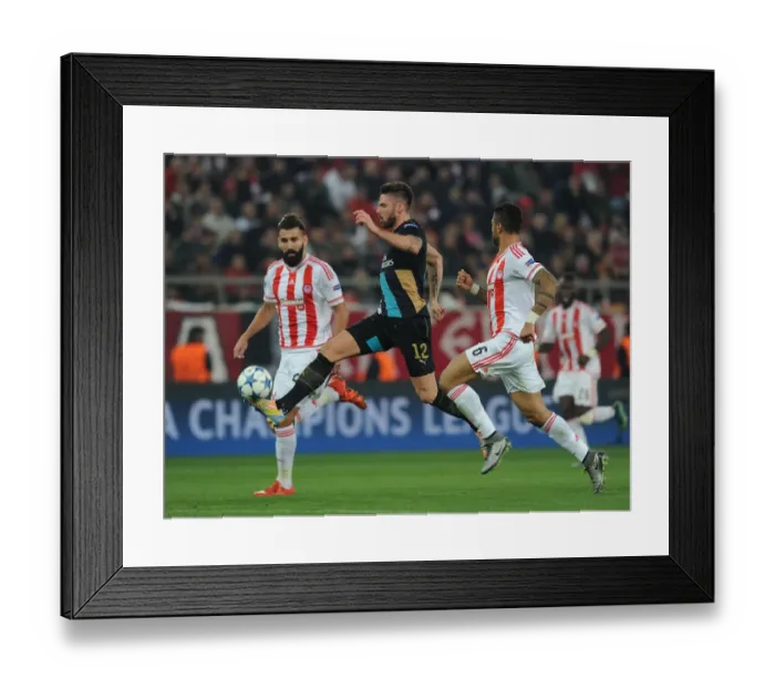 Framed Print : Giroud vs Siovas and da Costa: A Fierce Face-Off in Olympiacos vs Arsenal UEFA Champions League Match Framed Print : Giroud vs Siovas and da Costa: A Fierce Face-Off in Olympiacos vs Arsenal UEFA Champions League Match