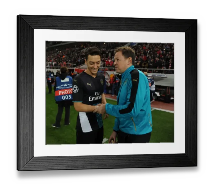 Framed Print : Arsenal's Mesut Ozil and Colin Lewin: Pre-Match Focus at Olympiacos (December 2015)