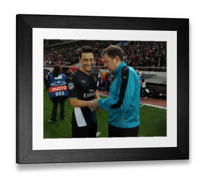 Framed Print : Mesut Ozil and Colin Lewin: Arsenal's Focus Before Olympiacos Clash (2015-16) Framed Print : Mesut Ozil and Colin Lewin: Arsenal's Focus Before Olympiacos Clash (2015-16)