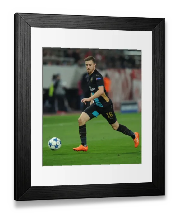 Framed Print : Arsenal's Aaron Ramsey in Action against Olympiacos, UEFA Champions League (December 2015), Athens, Greece Framed Print : Arsenal's Aaron Ramsey in Action against Olympiacos, UEFA Champions League (December 2015), Athens, Greece
