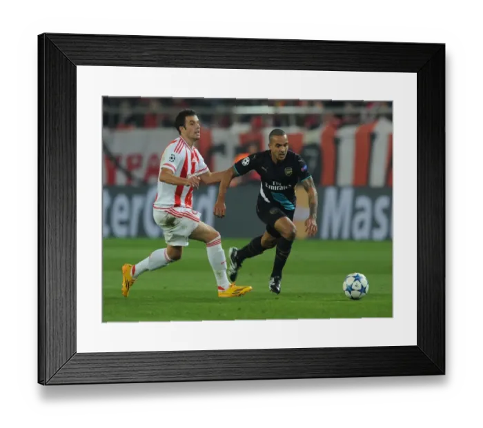 Framed Print : Theo Walcott Outmaneuvers Lukas Milivojevic: Olympiacos vs. Arsenal, UEFA Champions League, 2015 Framed Print : Theo Walcott Outmaneuvers Lukas Milivojevic: Olympiacos vs. Arsenal, UEFA Champions League, 2015