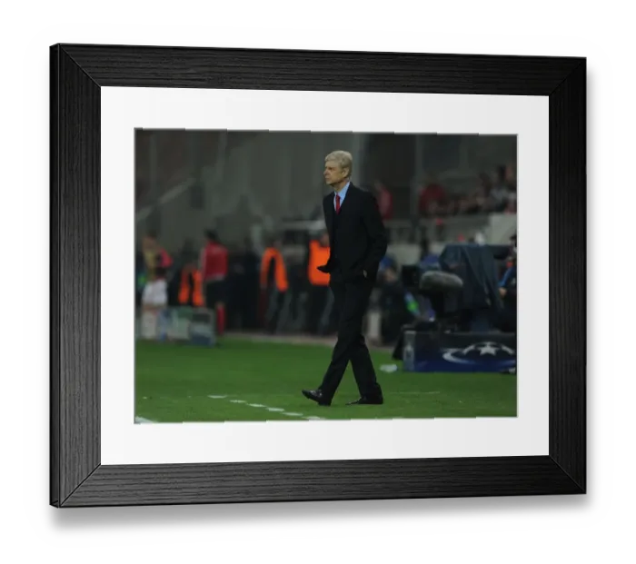 Framed Print : Arsene Wenger at Olympiacos vs Arsenal, UEFA Champions League 2015: A Tense Look from the Arsenal Manager's Bench in Athens