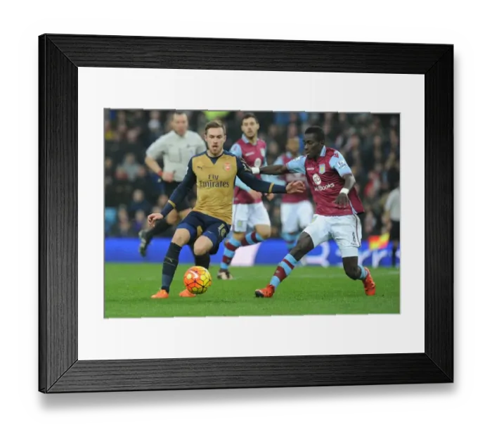 Framed Print : Ramsey vs. Gana: A Premier League Showdown at Villa Park Framed Print : Ramsey vs. Gana: A Premier League Showdown at Villa Park
