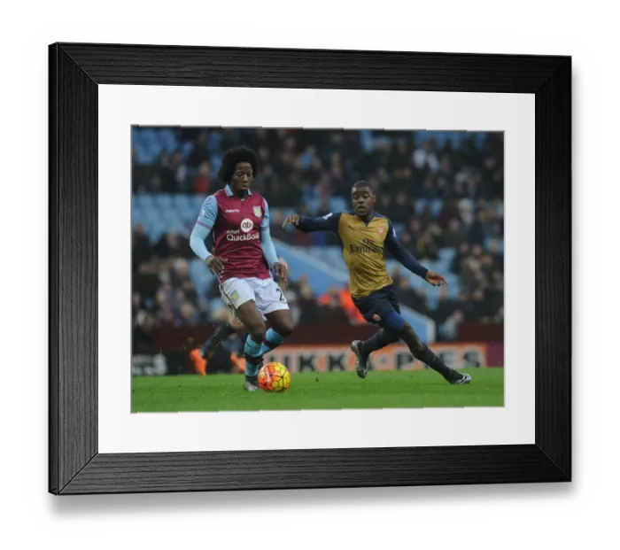 Framed Print : Intense Rivalry: Campbell vs Sanchez Showdown in Aston Villa vs Arsenal Premier League Clash