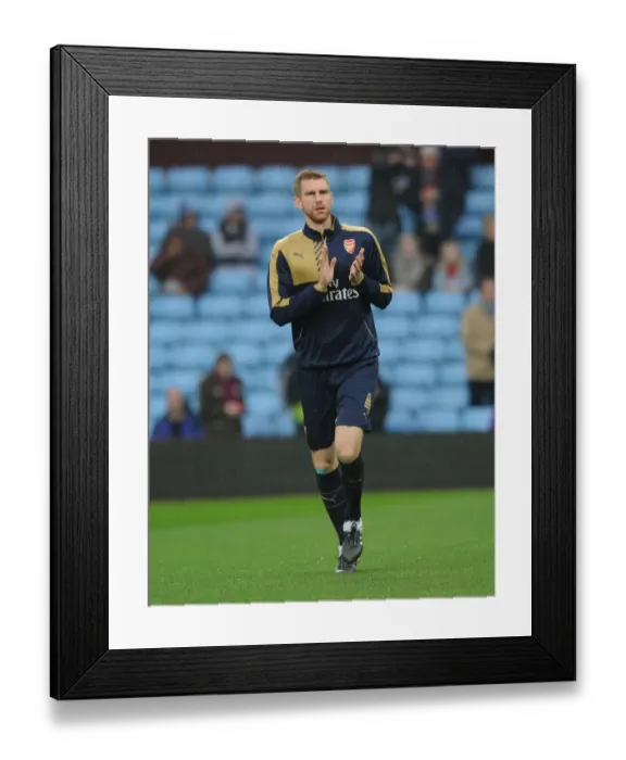 Framed Print : Per Mertesacker Prepares: Aston Villa vs Arsenal (2015-16) Framed Print : Per Mertesacker Prepares: Aston Villa vs Arsenal (2015-16)
