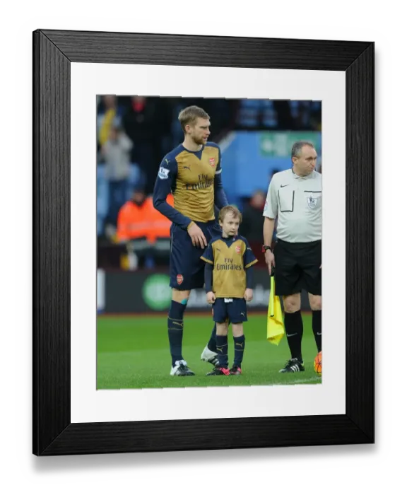 Framed Print : Arsenal's Triumph: Per Mertesacker and the Gunners Celebrate 2-0 Victory over Aston Villa at Villa Park (Premier League, December 13, 2015) Framed Print : Arsenal's Triumph: Per Mertesacker and the Gunners Celebrate 2-0 Victory over Aston Villa at Villa Park (Premier League, December 13, 2015)