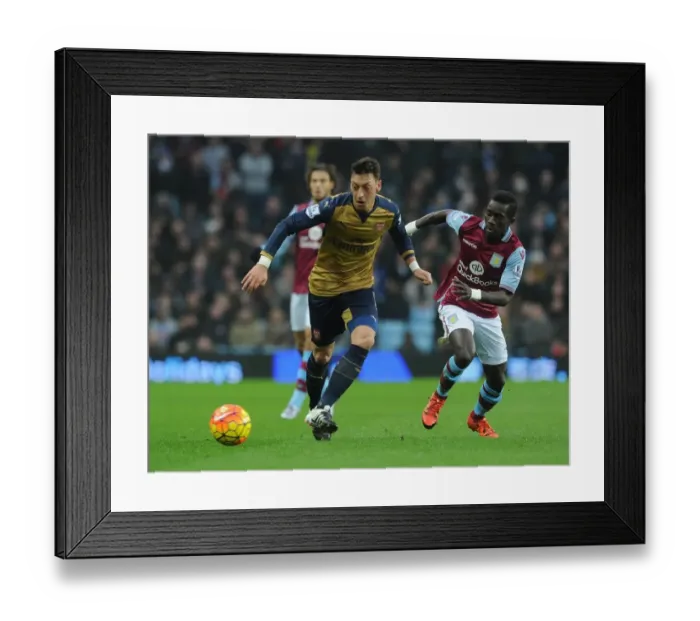 Framed Print : Mesut Ozil Faces Intense Pressure from Idrissa Gana: Aston Villa vs Arsenal, Premier League 2015-16