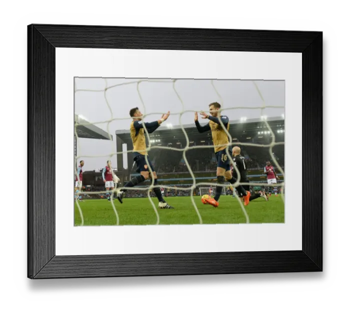 Framed Print : Ramsey and Ozil's Jubilant Moment: Arsenal's Victory over Aston Villa, Premier League 2015-16