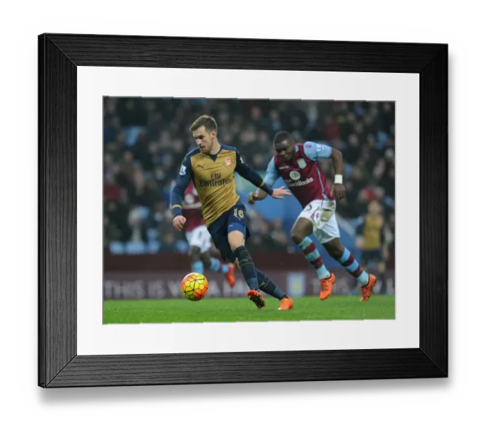 Framed Print : Intense Rivalry: Ramsey vs. Okore Clash in Aston Villa vs. Arsenal Premier League Framed Print : Intense Rivalry: Ramsey vs. Okore Clash in Aston Villa vs. Arsenal Premier League