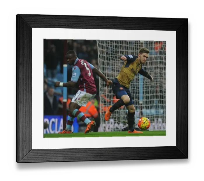 Framed Print : Battle in the Midfield: Aaron Ramsey vs. Jores Okore (Premier League, 2015) Framed Print : Battle in the Midfield: Aaron Ramsey vs. Jores Okore (Premier League, 2015)
