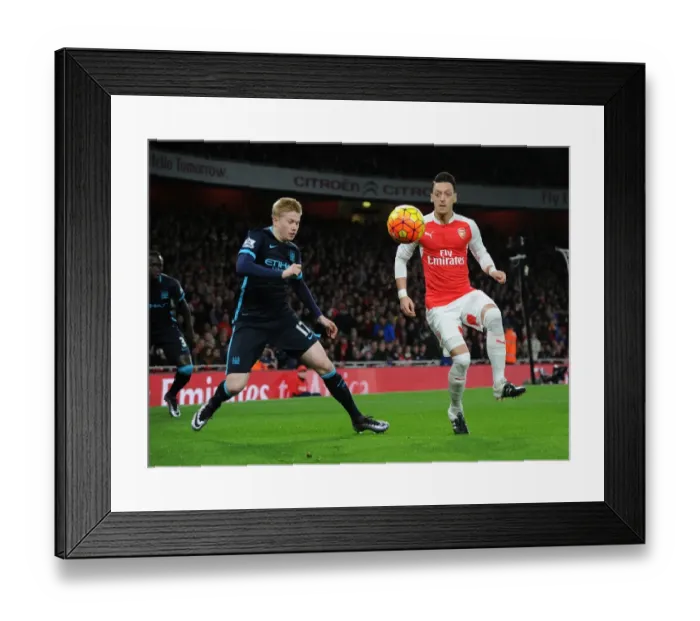Framed Print : Ozil vs De Bruyne: Premier League Showdown - Arsenal vs Manchester City, London 2015 Framed Print : Ozil vs De Bruyne: Premier League Showdown - Arsenal vs Manchester City, London 2015