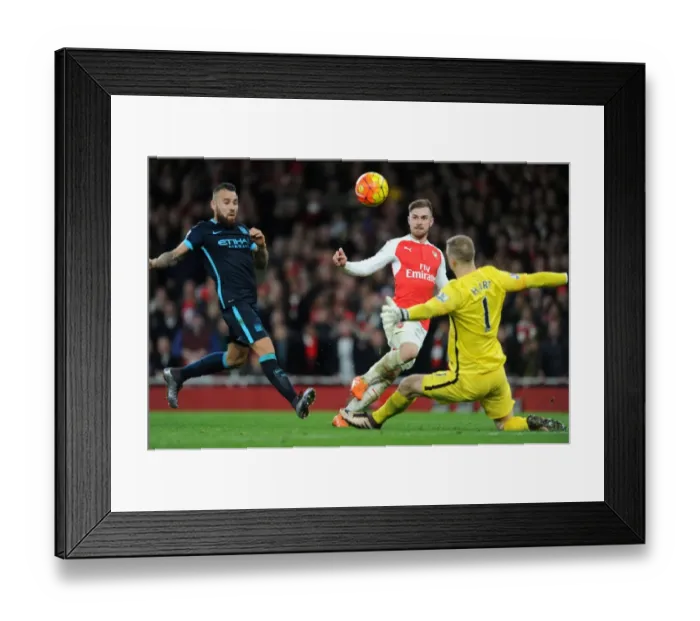 Framed Print : Ramsey's Last-Minute Chip Thwarted by Otamendi's Intervention: Arsenal vs Manchester City, 2015-16 Premier League
