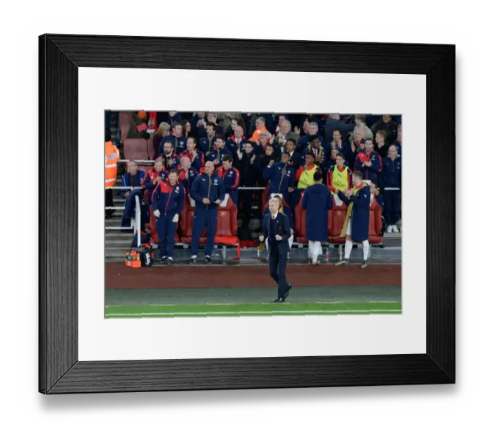 Framed Print : Arsenal Celebrates First Goal Against Manchester City (2015-16): Arsene Wenger and Team Rejoice on the Emirates Stadium Bench