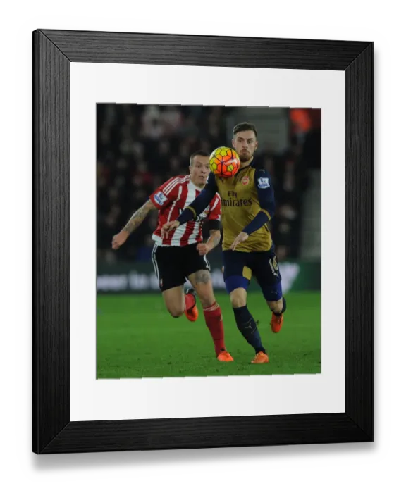 Framed Print : Arsenal's Ramsey Outsmarts Southampton's Clasie in Premier League Battle (December 2015) Framed Print : Arsenal's Ramsey Outsmarts Southampton's Clasie in Premier League Battle (December 2015)