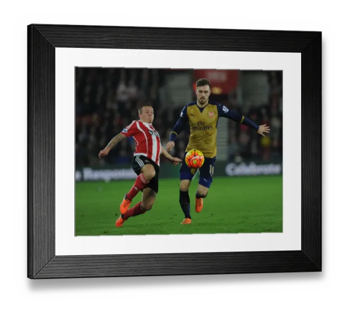 Framed Print : Arsenal's Ramsey Outwits Southampton's Clasie: Premier League Battle (December 2015)