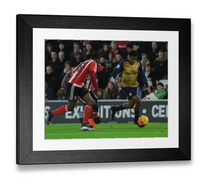 Framed Print : Arsenal's Alex Iwobi Faces Off Against Southampton's Cuco Martina in Intense Premier League Clash (December 2015)