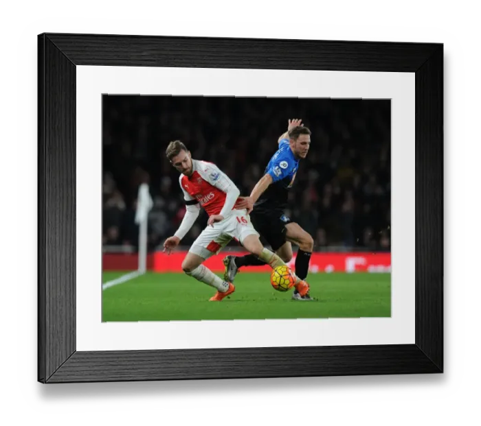 Framed Print : Ramsey vs Gosling: Intense Battle in Arsenal vs Bournemouth Premier League Clash (December 2015) Framed Print : Ramsey vs Gosling: Intense Battle in Arsenal vs Bournemouth Premier League Clash (December 2015)