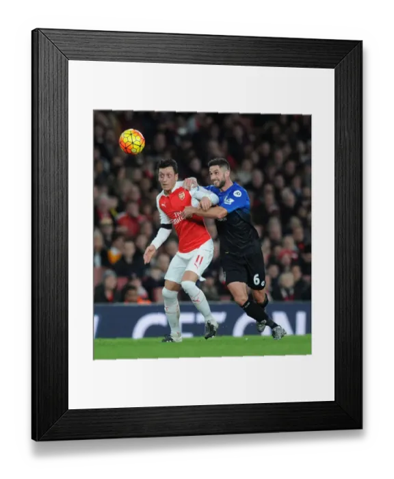 Framed Print : Ozil vs Surman: Intense Clash Between Arsenal's Maestro and Bournemouth's Midfield General in the Premier League (December 2015)