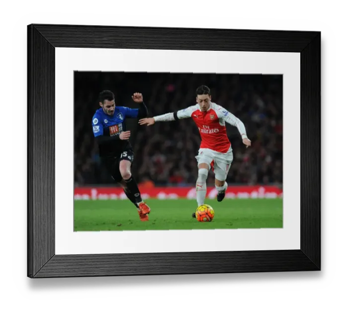 Framed Print : Ozil vs Smith: Arsenal vs Bournemouth Clash in Premier League (December 2015)