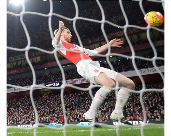 Per Mertesacker's Header Secures 2-0 Victory for Arsenal over Bournemouth in the Premier League