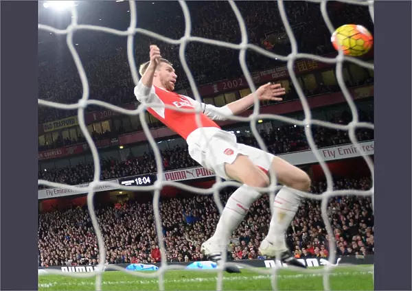 Per Mertesacker's Header Secures 2-0 Victory for Arsenal over Bournemouth in the Premier League