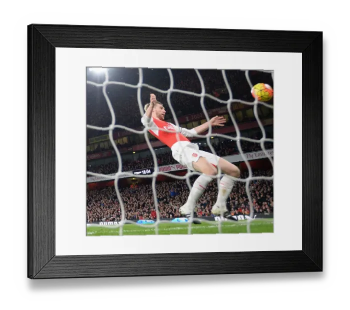 Framed Print : Per Mertesacker's Header Secures 2-0 Victory for Arsenal over Bournemouth in the Premier League Framed Print : Per Mertesacker's Header Secures 2-0 Victory for Arsenal over Bournemouth in the Premier League