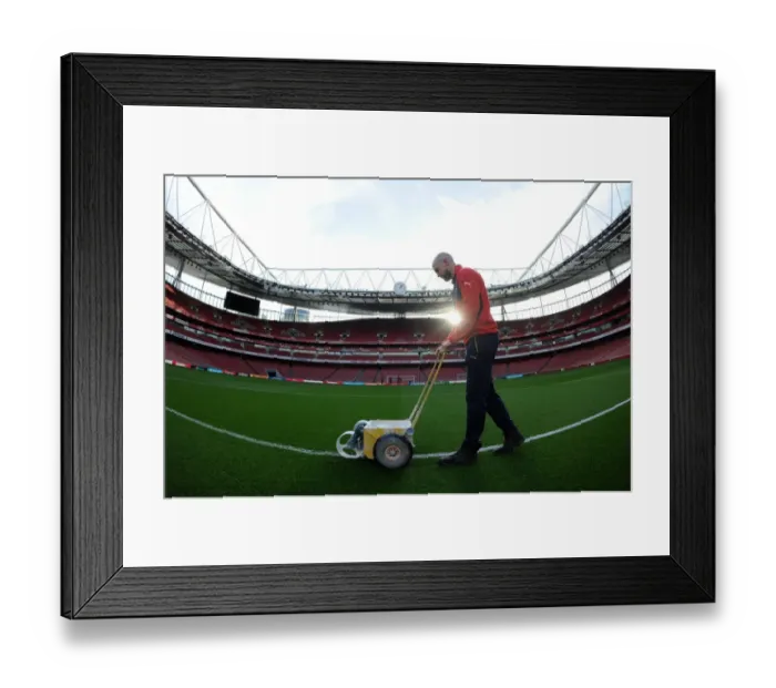 Framed Print : The pitch is marked out before the match Framed Print : The pitch is marked out before the match