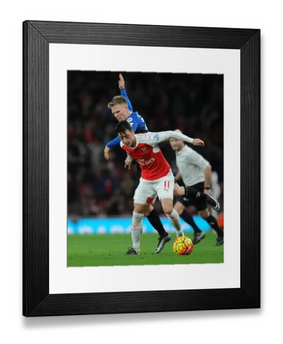 Framed Print : Ozil vs Ritchie: Clash of the Midfield Maestros in Arsenal vs Bournemouth (December 2015)