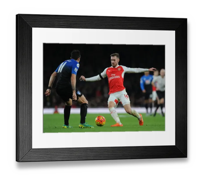 Framed Print : Ramsey vs. Daniels: Intense Clash in Arsenal's Battle against Bournemouth