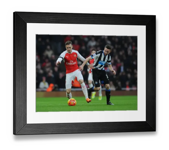 Framed Print : Ramsey vs Dummett: Intense Battle in the Premier League - Arsenal vs Newcastle United (2015-16)