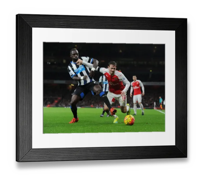 Framed Print : Monreal vs Sissoko: A Premier League Showdown at Emirates Stadium (2015-16) Framed Print : Monreal vs Sissoko: A Premier League Showdown at Emirates Stadium (2015-16)