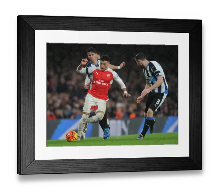 Framed Print : Arsenal's Oxlade-Chamberlain Clashes with Newcastle's Dummett and Perez