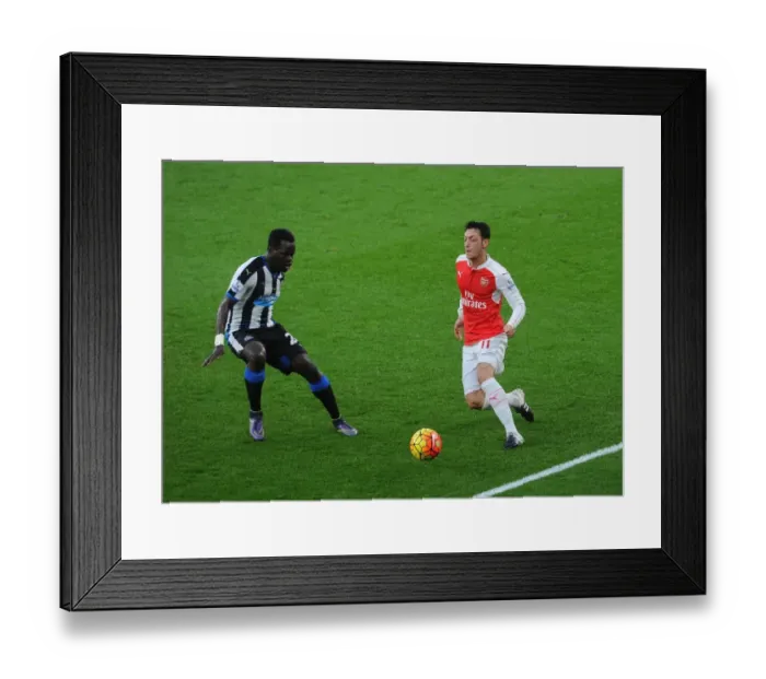 Framed Print : Intense Rivalry: Mesut Ozil vs. Cheick Tiote at Emirates Stadium (Arsenal vs. Newcastle United, 2015-16) Framed Print : Intense Rivalry: Mesut Ozil vs. Cheick Tiote at Emirates Stadium (Arsenal vs. Newcastle United, 2015-16)
