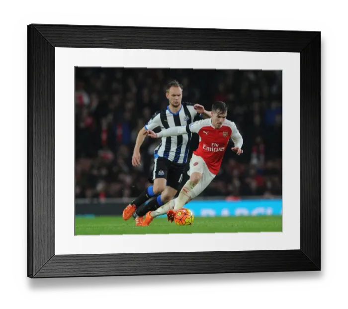 Framed Print : Ramsey vs. De Jong: Clash of the Midfielders in Arsenal vs. Newcastle Premier League Showdown Framed Print : Ramsey vs. De Jong: Clash of the Midfielders in Arsenal vs. Newcastle Premier League Showdown