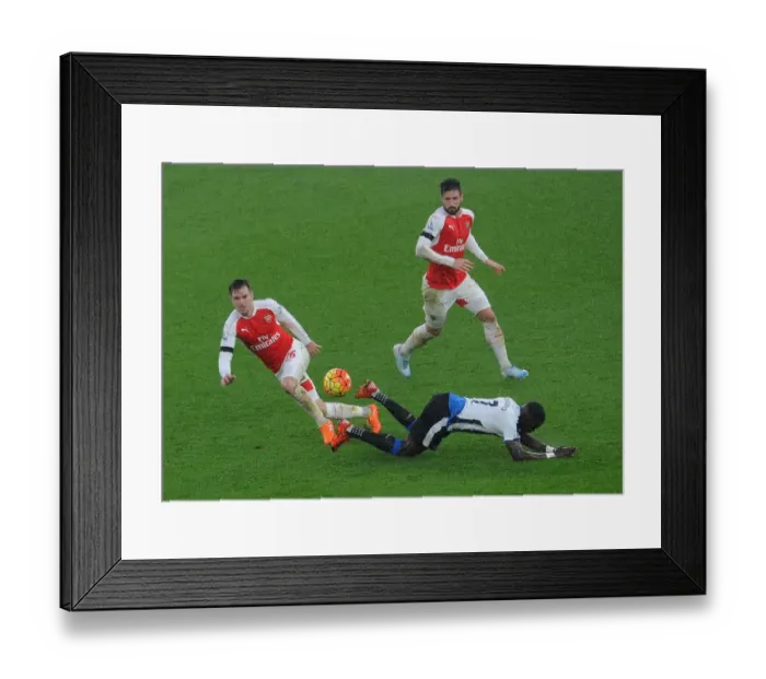Framed Print : Ramsey vs Sissoko: A Premier League Showdown - Arsenal's Battle with Newcastle's Midfielders Framed Print : Ramsey vs Sissoko: A Premier League Showdown - Arsenal's Battle with Newcastle's Midfielders