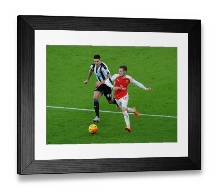 Framed Print : Intense Battle: Ramsey vs Mitrovic - A Premier League Showdown