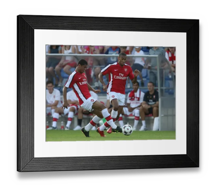 Framed Print : Denilson and Armand Traore: Victory in Ritzing, Austria (28 / 7 / 2008)